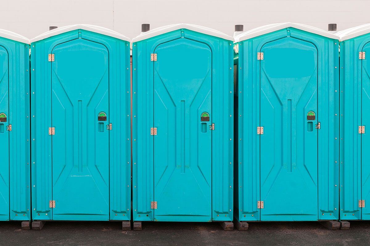 Industrial portable restroom units at a plant in Pomona, California